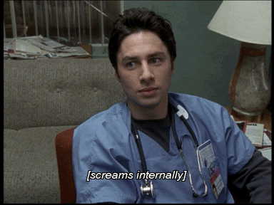 An image of J.D. (Zach Braff) from Scrubs, dressed in blue doctor's scrubs. Caption: [screams internally]. The image is an animated gif that shows J.D. moving his mouth and head slightly.