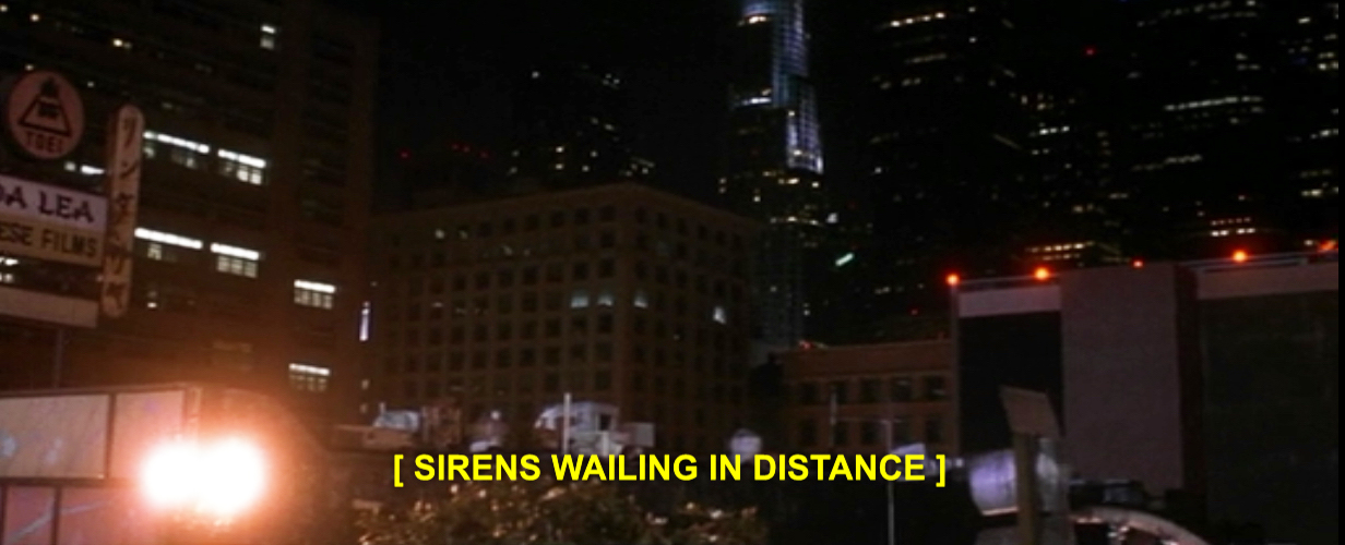A frame from The Prophecy 3: The Ascent (2000) featuring a cityscape at night and the closed caption: [ SIRENS WAILING IN DISTANCE]